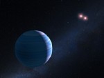 HST objevil planetu obíhající kolem dvojhvězdy